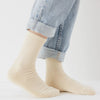 cream colored ribbed baggu crew socks