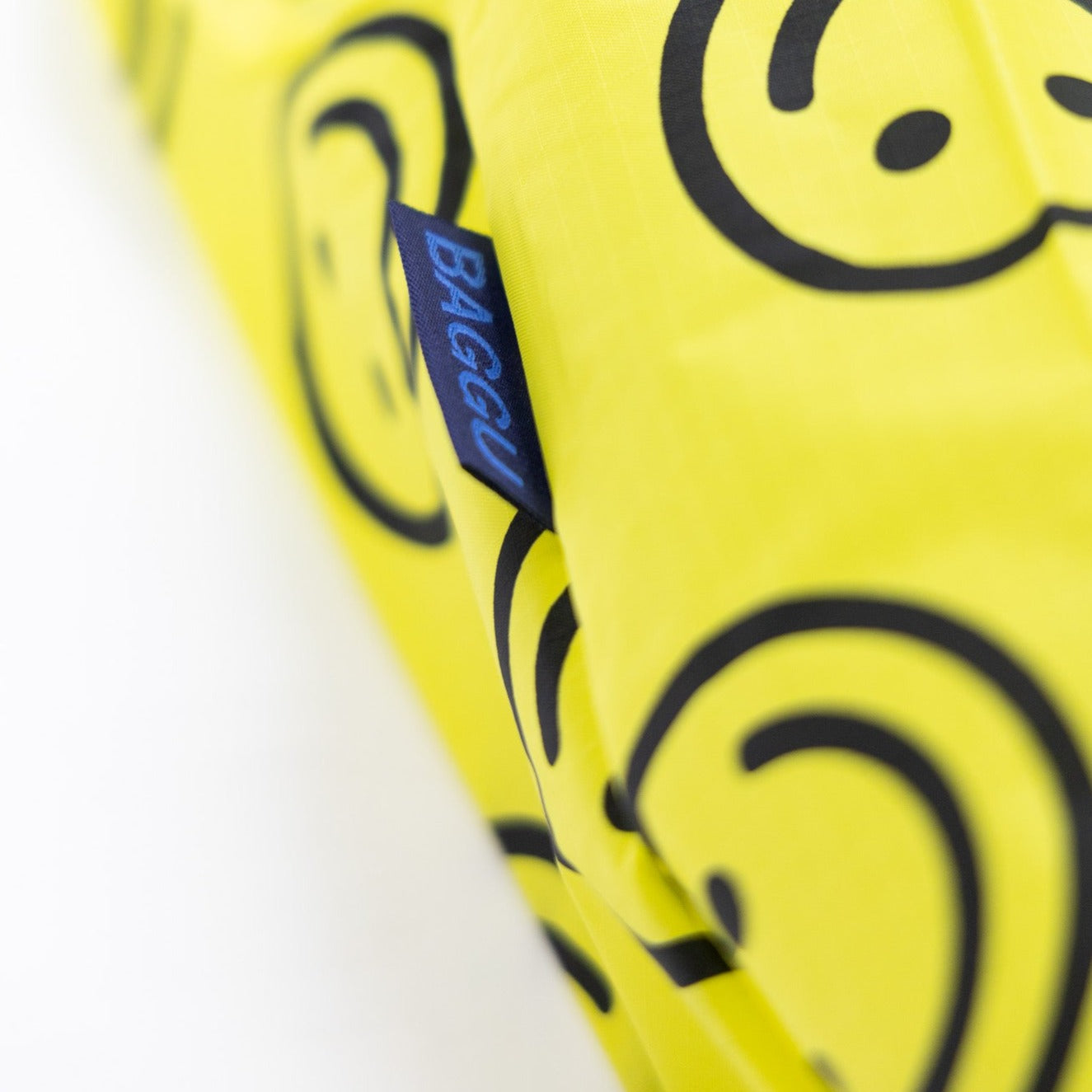 Baggu Standard Reusable tote Bag with yellow smiley face