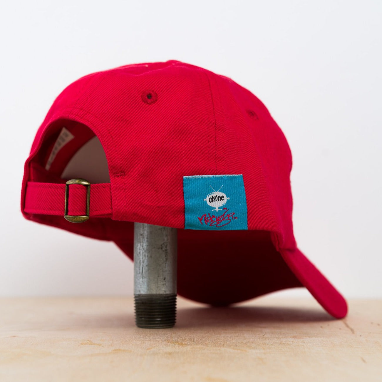 red embroidered hat with the northside jackson