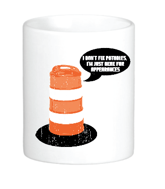 coffee mug with an orange traffic cone and the slogan I don't fix potholes i'm just here for appearances