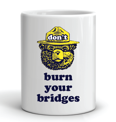 11oz coffee mug with smokey bear don't burn your bridges design
