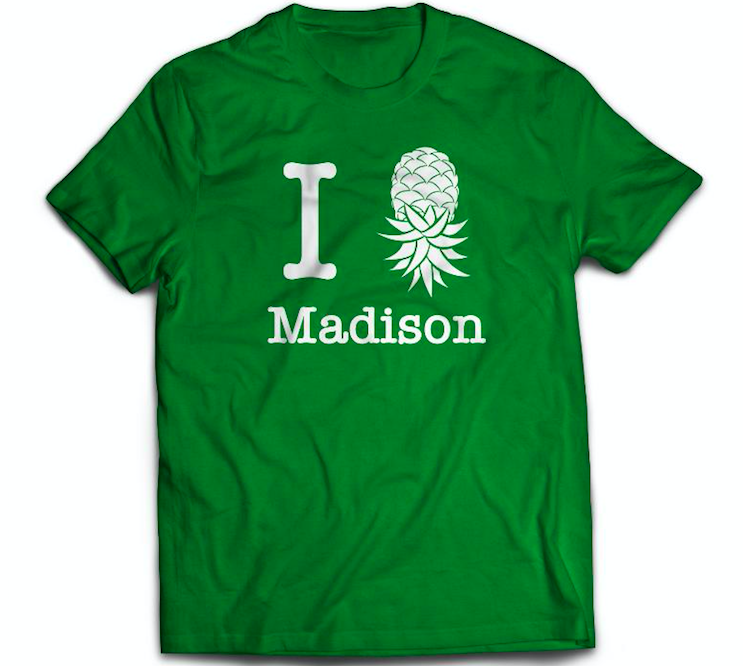 tee shirt featuring the slogan i swing madison mississippi with a pineapple instead of a heart