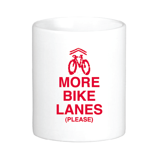 coffee mug featuring the slogan more bike lanes please