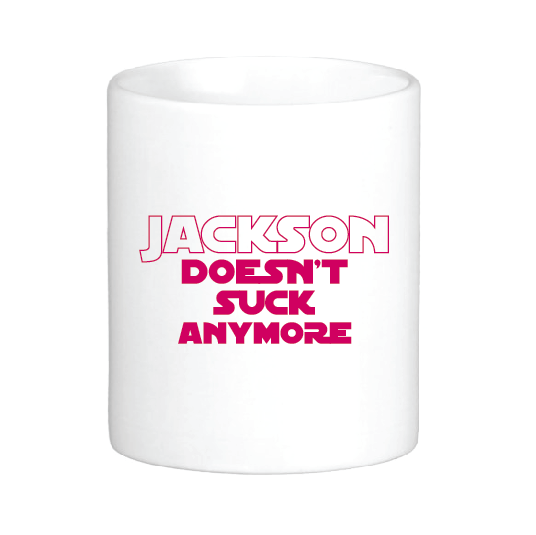 coffee mug with the slogan Jackson Doesn't Suck Anymore Mug