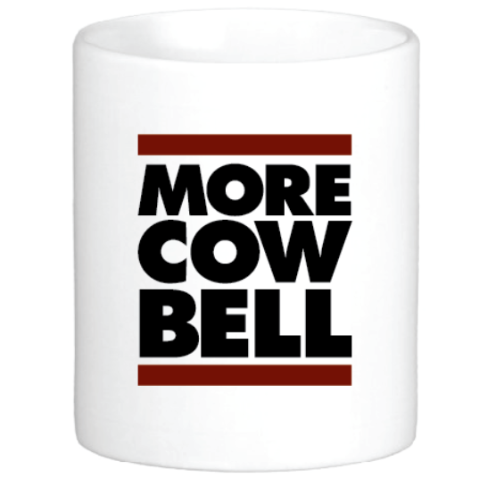coffee mug featuring the slogan more cow bell inbetween two bars