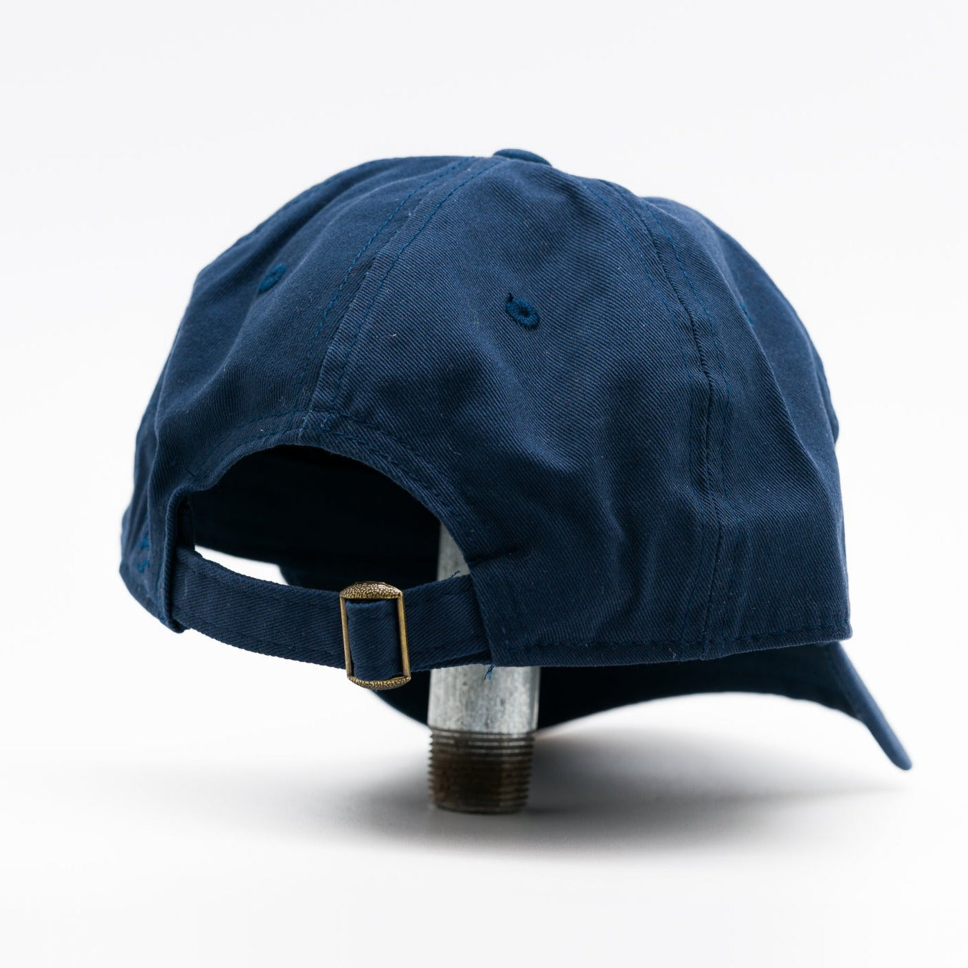 navy blue embroidered hat featuring the ski mississippi logo in green brown and orange