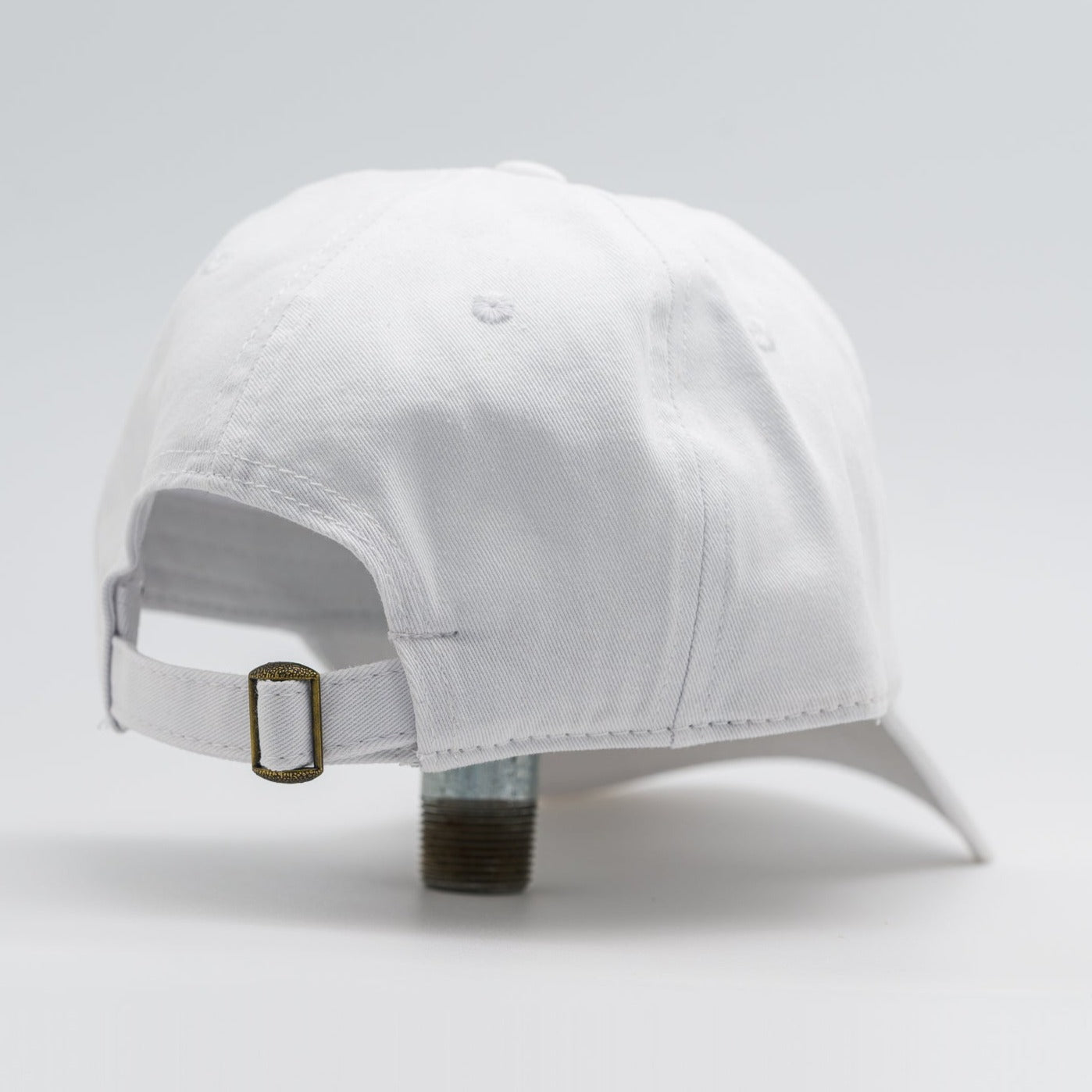 white embroidered hat featuring the ski mississippi logo in green brown and orange