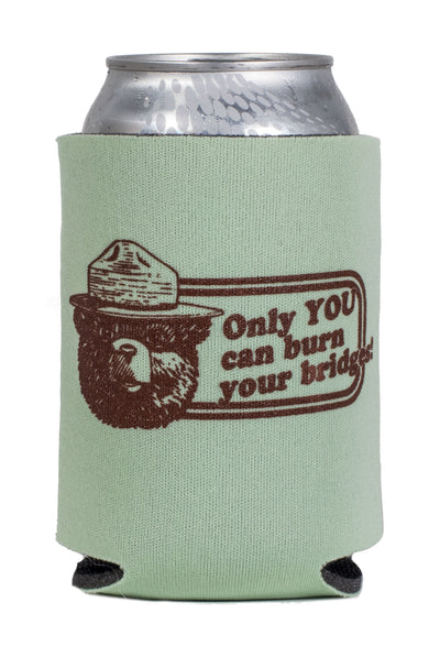 koozie with a graphic design featuring a smokey the bear and text that reads only you can burn your bridges on a white background