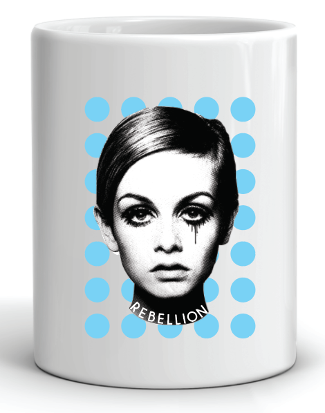 coffee mug featuring iconic super model twiggy or perhaps edie sedgwick against blue dots and the word rebellion