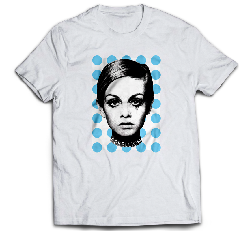 white tee shirt featuring iconic super model twiggy or perhaps edie sedgwick against blue dots and the word rebellion
