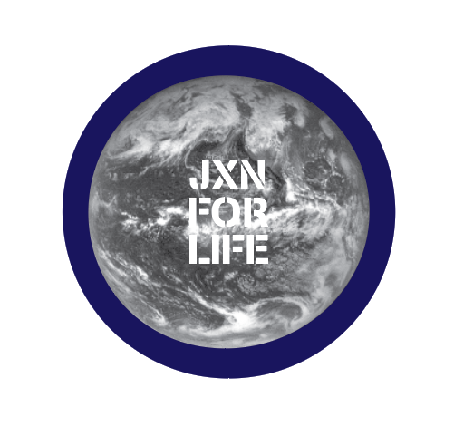 button featuring the earth and the words jxn or jackson for life