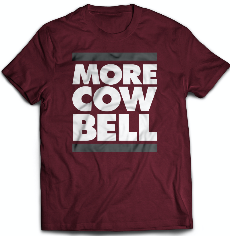 tee shirt featuring the slogan more cow bell inbetween two bars