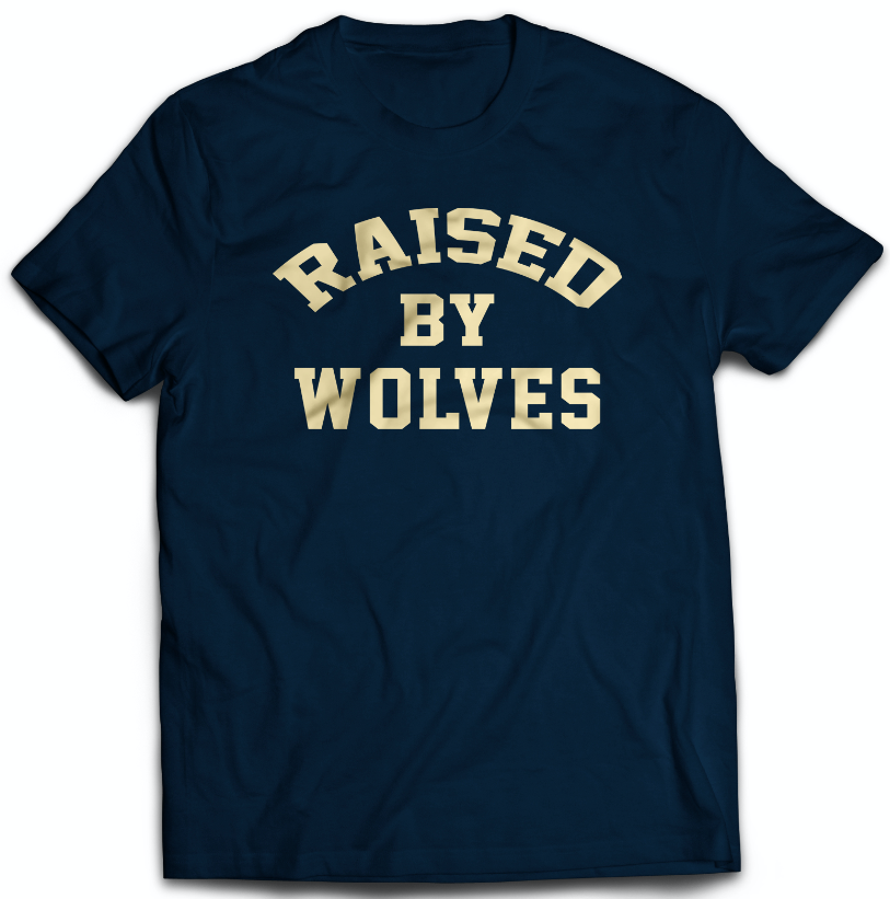 TEE SHIRT FEATURING THE SLOGAN RAISED BY WOLVES